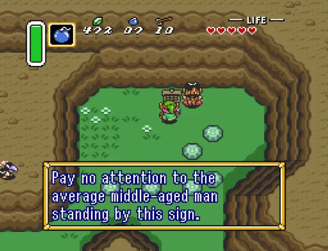 Screenshot from The Legend of Zelda: A Link to the Past. Pay no attention to the average middle-aged man standing by this sign.